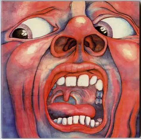 Copertina iconica dell’album 'In the Court of the Crimson King' dei King Crimson, simbolo di una scoperta musicale rivoluzionaria nel progressive rock.